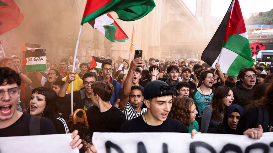 Students gather for a demonstration, as dockworkers take part in a strike near the port of Genoa as part of a nationwide "Let's Block Everything" protest, with activists calling for a halt to arms shipments to Israel, in Genoa, Italy, September 22, 2025. REUTERS/Matteo Minnella