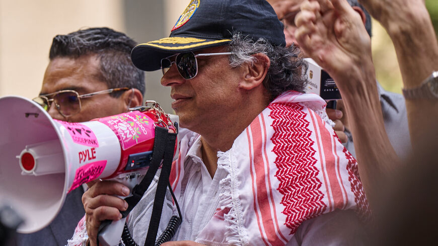 FILE PHOTO: Colombian President Gustavo Petro addresses pro-Palestinian demonstrators at Dag Hammarskjold Plaza outside U.N. headquarters during the 80th United Nations General Assembly in New York City, U.S., September 26, 2025. REUTERS/Bing Guan/File Photo