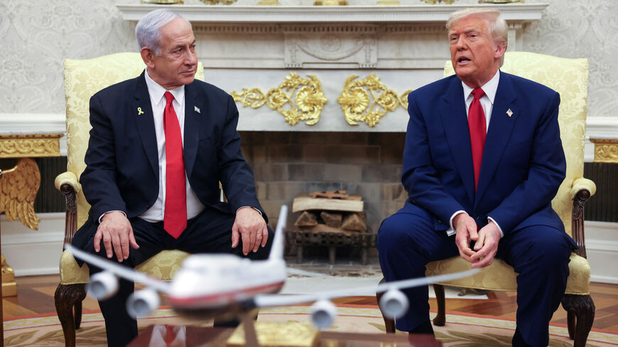 FILE PHOTO: U.S. President Donald Trump meets with Israeli Prime Minister Benjamin Netanyahu in the Oval Office at the White House in Washington, U.S., April 7, 2025. REUTERS/Kevin Mohatt/ File Photo