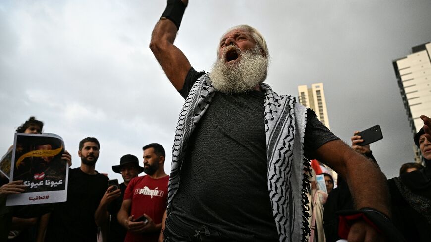A supporter of Lebanon's Hezbollah group chants slogans during a gathering in Beirut on September 17, 2025