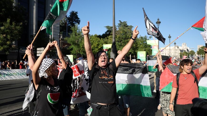 Pro-Palestinians protestors take to the streets during the final stage of the Vuelta cyclig race in Madrid on Sunday