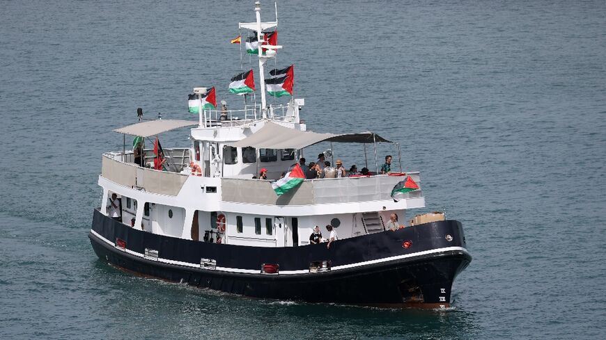 A boat carrying Swedish climate campaigner Greta Thunberg and other activists leaves the port of Barcelona on August 31, 2025