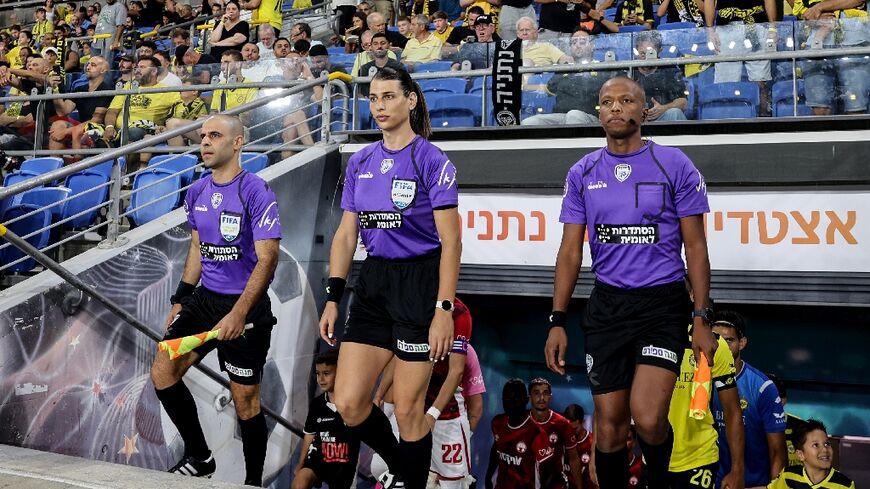 Israeli referee Sapir Berman (C) became the first transgender woman to officiate an international football match
