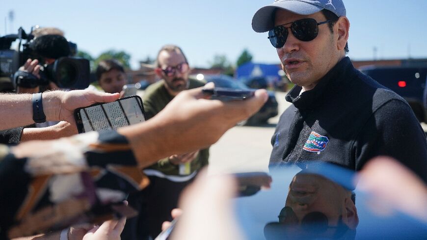 US Secretary of State Marco Rubio speaks to reporters at Joint Base Andrews before departing for Israel
