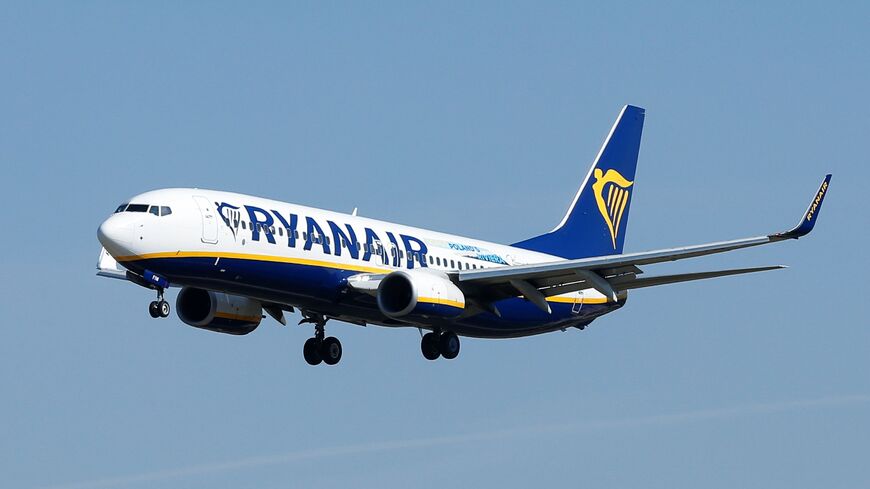 A Ryanair Boeing 737-800 aircraft lands at Barcelona's 'El Prat' airport on September 28, 2018