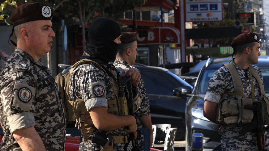 Lebanese army soldiers stand guard near a polling station during the municipal elections in Nabatieh in southern Lebanon on May 24, 2025.