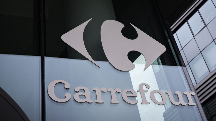 This photograph shows Carrefour's logo displayed on the headquarters building in Massy, near Paris, on May 28, 2025.