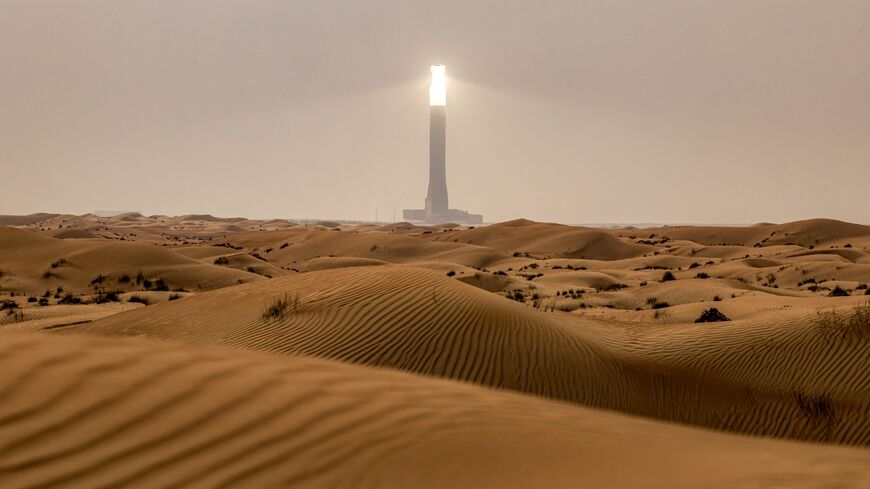 The tallest solar power tower in the world at 260 meters is pictured at the concentrated solar thermal power Noor Energy 1 solar complex at Mohammed bin Rashid Al Maktoum Solar Park, about 50 kilometers south of Dubai, on July 19, 2025.