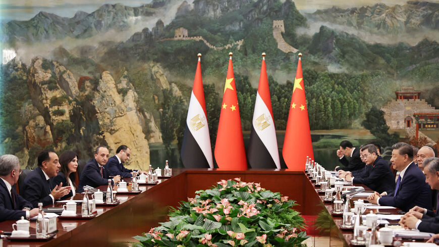 Egypt's Prime Minister Mostafa Madbouly (2nd R) speaks during a bilateral meeting with China's President Xi Jinping (2nd L) ahead of the Shanghai Cooperation Organization Summit, Tianjin, China, Aug. 30, 2025.