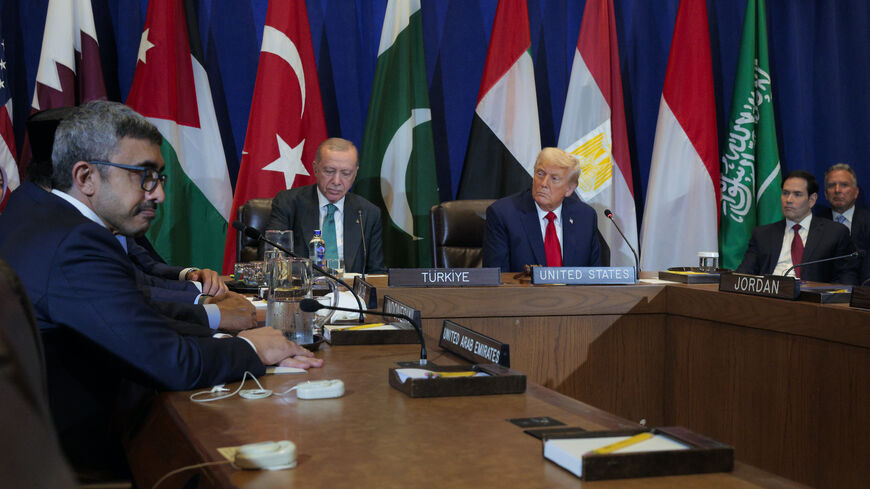 President Donald Trump (C-R) and President of Turkey Recep Tayyip Erdogan (C-L) listen during a multilateral meeting with leaders from several Arab and Muslim-majority countries at the 80th session of the UN’s General Assembly (UNGA) at the United Nations headquarters on Sept. 23, 2025 in New York City. 