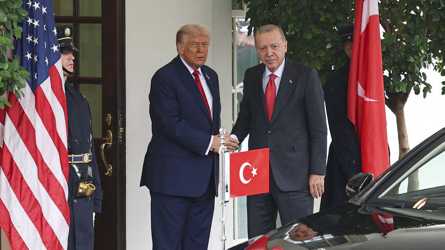 US President Donald Trump (L) greets Turkish President Recep Tayyip Erdogan (R) upon his arrival at the White House in Washington, D.C., on Sept. 25, 2025. 