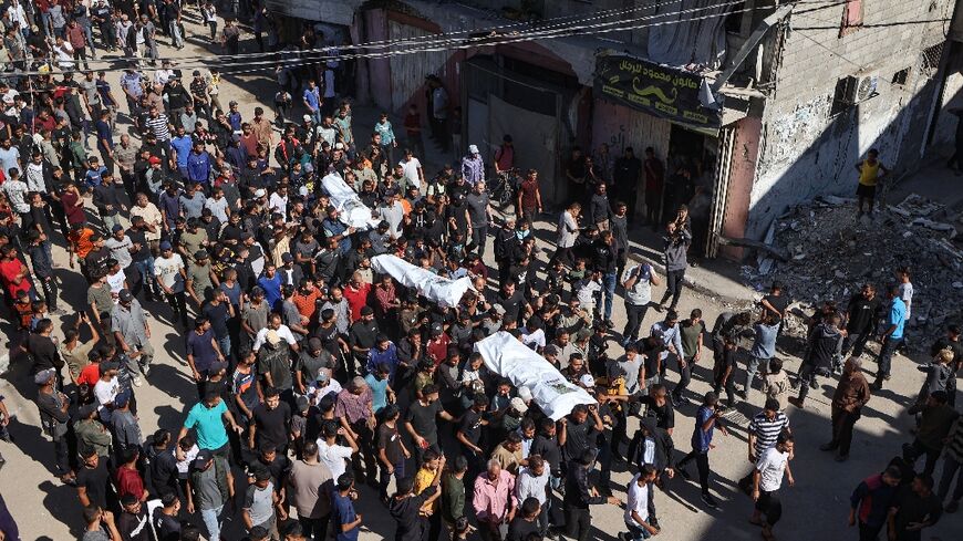 Israel returned the bodies of 15 Palestinians to Gaza Saturday, bringing the total handed over to 135