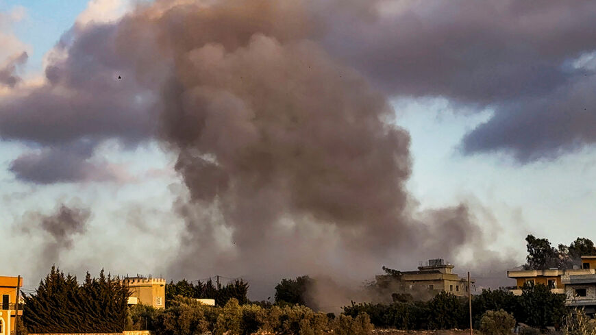 Smoke billows over Kfar Tebnit after an Israeli strike near Lebanon’s border with Israel, in Lebanon, September 18, 2025. REUTERS/Ali Hankir