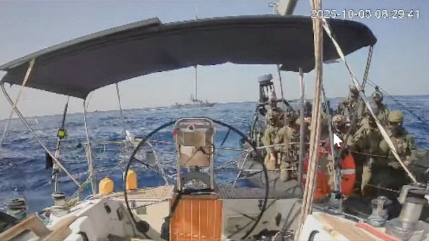 A screengrab from a live stream video shows Israeli navy forces approaching the vessel the Marinette, believed to be the only ship from the Global Sumud Flotilla still sailing towards Gaza, which flotilla organisers report has now been intercepted, October 3, 2025. Global Sumud Flotilla/Handout via REUTERS