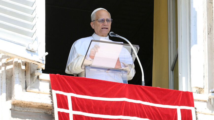 Pope Leo XIV speaks as he appears to lead the weekly Angelus prayer, at the Vatican, September 21, 2025.   Vatican Media/Mario Tomassetti/Handout via REUTERS