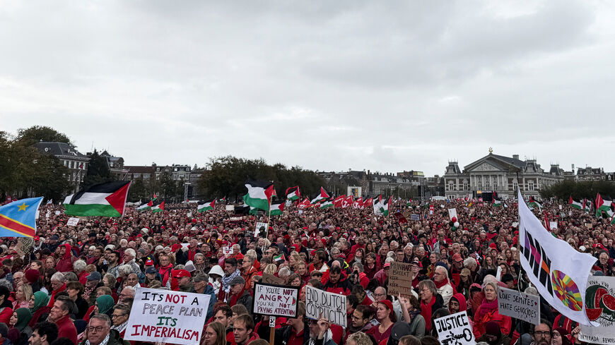 Pro-Palestinian protesters gather at Museumplein ahead of a 6 km march through the city as part of a protest demanding a tougher stance from the Dutch government against Israel's war in Gaza, in Amsterdam, Netherlands, October 5, 2025. REUTERS/Charlotte Van Campenhout
