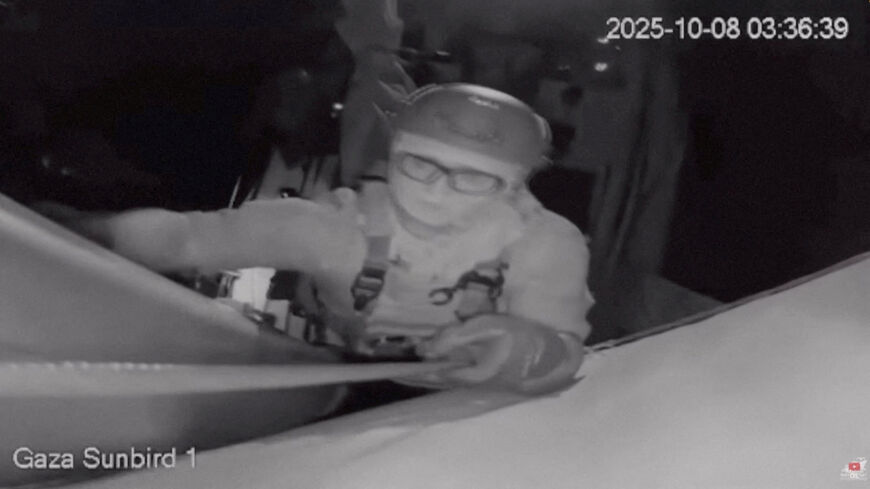 A screengrab from a live footage video shows an Israeli soldier smashing the CCTV camera of "Gaza Sunbird", a Gaza-bound vessel which is part of the Global Sumud Flotilla, with a gun as the boat is intercepted by Israeli security forces, in this screengrab obtained from a video released on October 8, 2025. Freedom Flotilla Coalition/Handout via REUTERS  THIS IMAGE HAS BEEN SUPPLIED BY A THIRD PARTY. MANDATORY CREDIT. NO RESALES. NO ARCHIVES.     TPX IMAGES OF THE DAY