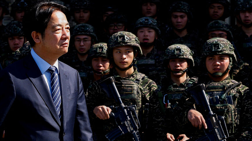 FILE PHOTO: Taiwan's President Lai Ching-te pays a visit to Songshan airbase in Taipei, Taiwan March 21, 2025. REUTERS/Ann Wang/File Photo/File Photo