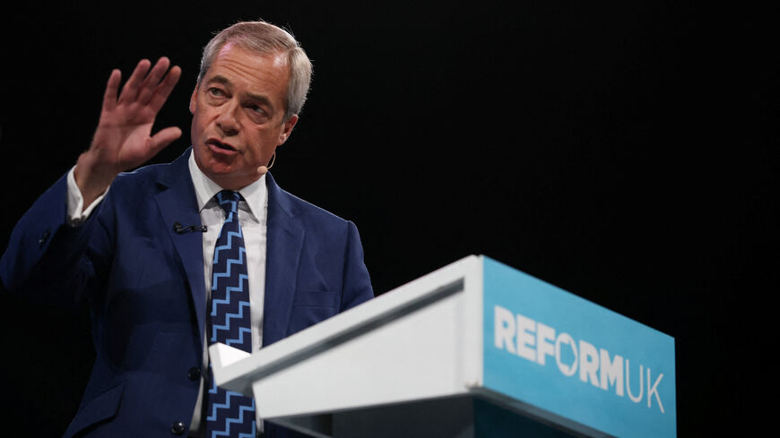 Britain's Reform UK Party leader Nigel Farage addresses the audience at Reform's national conference in Birmingham, Britain, September 5, 2025. REUTERS/Phil Noble