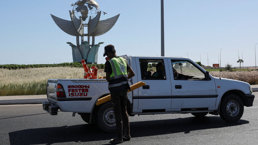 A municipal employee stops near Peace Square, during preparations for an international summit on Gaza, amid a ceasefire between Israel and Hamas, at the Red Sea resort of Sharm el-Sheikh, Egypt, October 11, 2025. REUTERS/Amr Abdallah Dalsh
