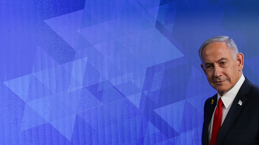 Israeli Prime Minister Benjamin Netanyahu walks after a press conference, in Jerusalem, May 21, 2025. REUTERS/Ronen Zvulun/Pool