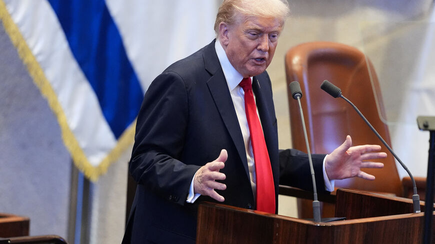 President Donald Trump speaks to the Knesset, Israel's parliament, Monday, Oct. 13, 2025, in Jerusalem.     Evan Vucci/Pool via REUTERS