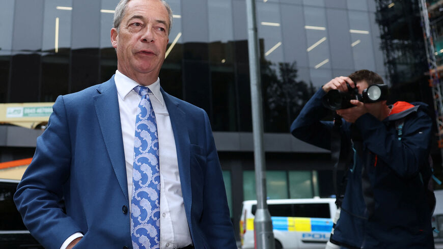 Nigel Farage, leader of Britain’s Reform UK party, arrives to attend the sentencing of Fayaz Khan, who was earlier found guilty of making a threat in a TikTok video to kill Farage, at Southwark Crown Court  in London, Britain, October 14, 2025. REUTERS/Toby Melville