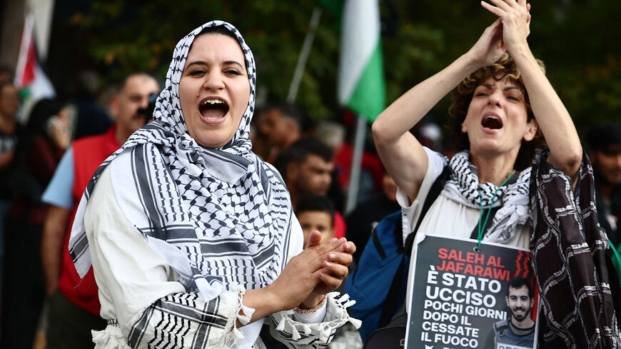 Soccer Football - FIFA World Cup - UEFA Qualifiers - Protesters rally against the Israeli national team - Udine, Italy - October 14, 2025 Protesters march against the Israeli football team during a pro-Palestinian demonstration ahead of the Italy v Israel match REUTERS/Yara Nardi