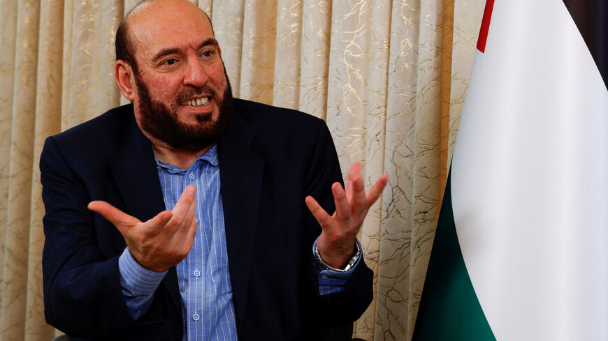 Hamas senior official Mohammed Nazzal speaks during an interview with Reuters, in Doha, Qatar, October 15, 2025. REUTERS/Ibraheem Abu Mustafa