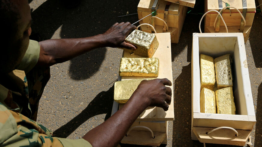 FILE PHOTO: Sudanese Rapid Support Forces (RSF) display gold bars seized from a plane that landed at Khartoum Airport in an investigation into possible smuggling, in Khartoum Sudan May 9, 2019. REUTERS/Mohamed Nureldin Abdallah/File Photo