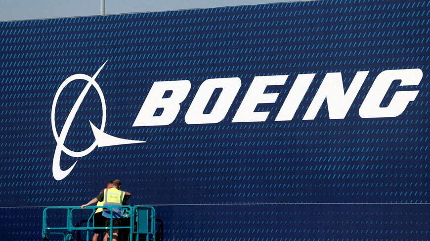 FILE PHOTO: A Boeing logo is seen before the opening of the 55th International Paris Airshow at Le Bourget Airport near Paris, France, June 13, 2025. REUTERS/Benoit Tessier/File Photo