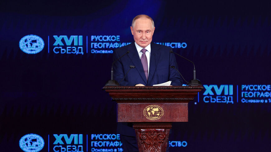 Russian President Vladimir Putin delivers a speech during a conference of the Russian Geographical Society in Moscow, Russia October 23, 2025. Sputnik/Vyacheslav Prokofyev/Pool via REUTERS