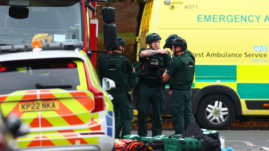 Manchester police at the scene of a car ramming and stabbing incident outside a synagogue