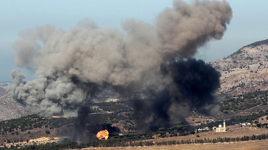 Smoke rises following an Israeli airstrike on the outskirts of the southern Lebanese village of Ej Jarmaq