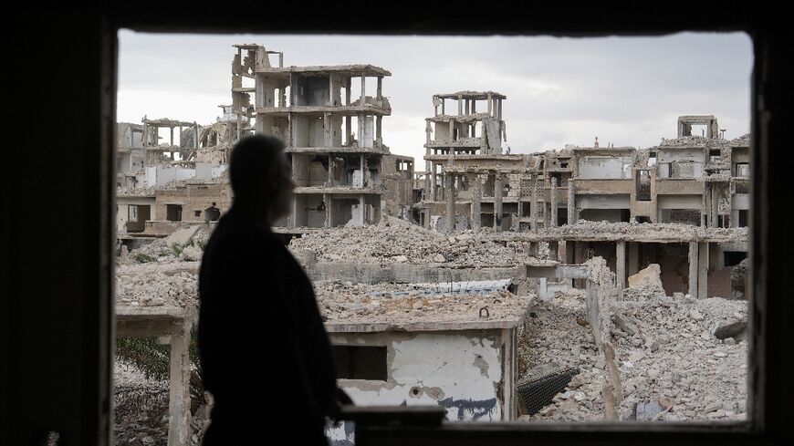 Damaged buildings at  The World Bank estimates Syria's post-war reconstruction could cost up to $216 billion