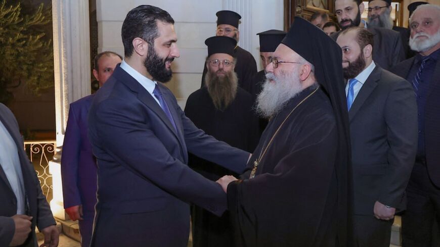 Syrian President Ahmed al-Sharaa meets with Patriarch John X Yazigi in Damascus, Oct. 26, 2025.
