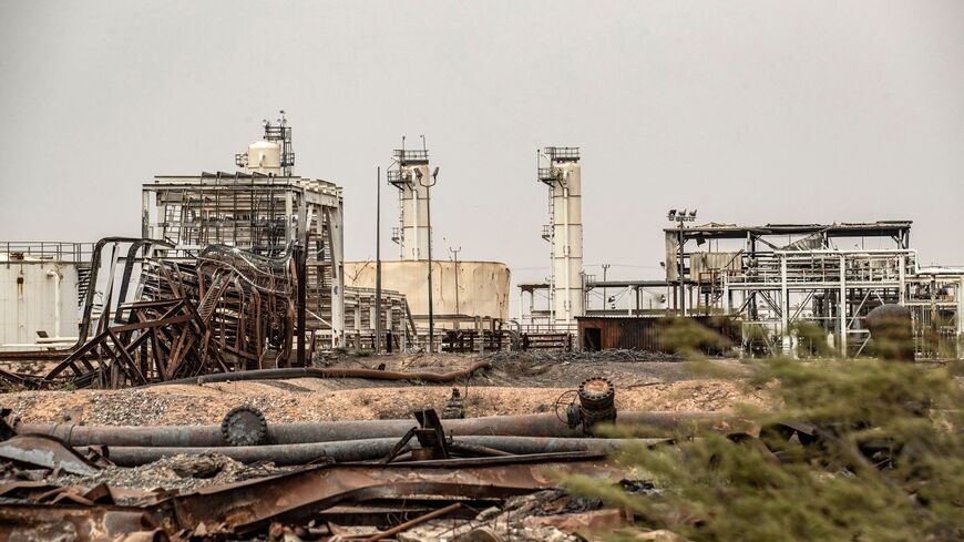 This picture taken on March 12, 2020 shows a view of oil production facilities at the Omar oil field in the eastern Syrian Deir Ezzor province. 