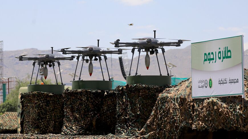 Drones are displayed on the back of a vehicle during an official military parade marking the ninth anniversary of the Houthi takeover of the capital, Sanaa, on Sept. 21, 2023.