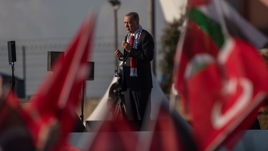 Turkey's president, Recep Tayyip Erdogan, speaks during a rally in solidarity with Palestinians in Gaza on Oct. 28, 2023, at Ataturk Airport in Istanbul, Turkey. 