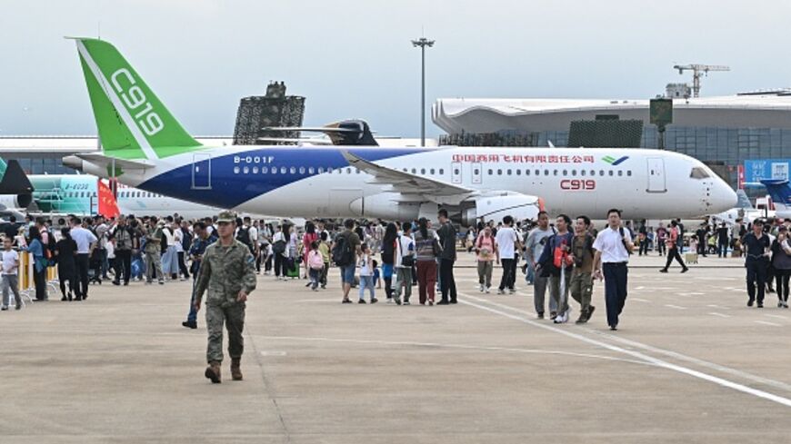 CHINA-AEROSPACE-EXHIBITION A Chinese Comac C919 aircraft is seen during the 15th China International Aviation and Aerospace Exhibition in Zhuhai, in southern China's Guangdong province on November 15, 2024. (Photo by Hector RETAMAL / AFP) (Photo by HECTOR RETAMAL/AFP via Getty Images)