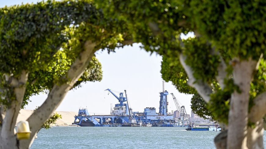 A ship sails along Egypt's Suez Canal near Ismailia, on April 16, 2025.