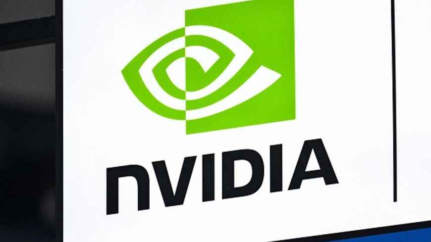 The Nvidia logo is seen during the World Artificial Intelligence Conference (WAIC) at the Shanghai World Expo and Convention Center in Shanghai on July 28, 2025. (Photo by Hector RETAMAL / AFP) (Photo by HECTOR RETAMAL/AFP via Getty Images)