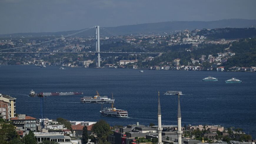 Ferries sail on Bosphorus in Istanbul, on August 29, 2025, next to the 15 July Martyrs Bridge, known as Bosphorus bridge. 