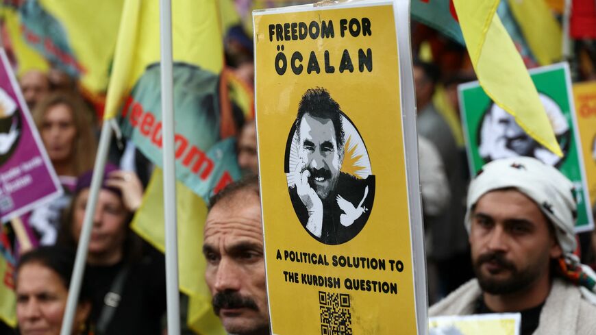 Kurds wave Kurdistan Workers' Party flags (PKK) and flags depicting Kurdistan Worker's Party (PKK) leader Abdullah Ocalan, during a demonstration to call for Ocalan's liberation outside the European Council in Strasbourg, eastern France, on Sept. 15, 2025. 
