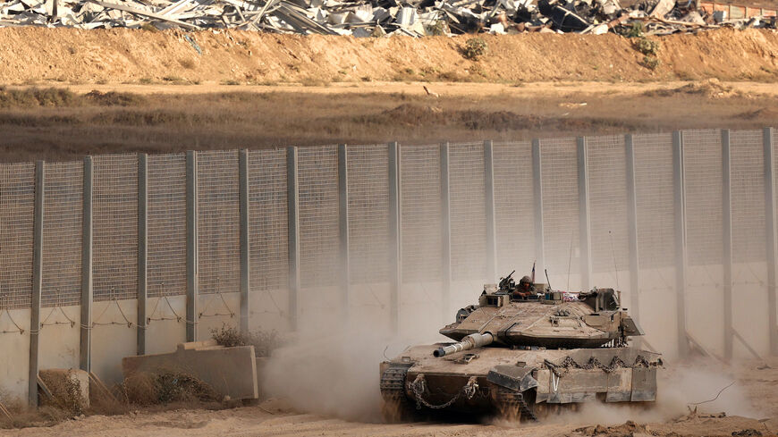 An Israeli tank moves along Israel's border with the Gaza Strip, on Sept. 25, 2025, amid the ongoing war between Israel and the Palestinian Hamas militant group. 
