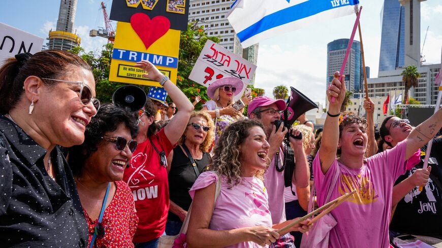 People celebrate at Hostages Square in Tel Aviv on Oct. 9, 2025, following the announcement of the new Gaza ceasefire deal. 