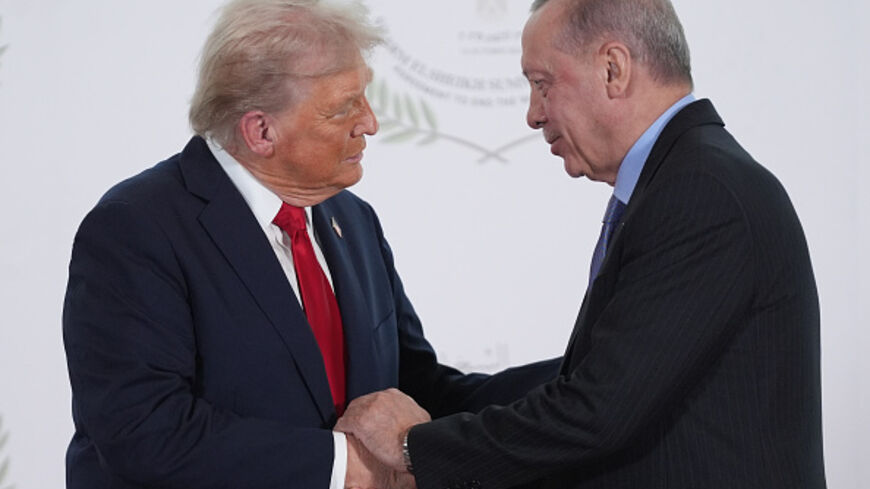 SHARM EL-SHEIKH, EGYPT - OCTOBER 13: U.S. President Donald Trump greets Turkey's President Recep Tayyip Erdogan during a world leaders' summit on ending the Gaza war on October 13, 2025 in Sharm El-Sheikh, Egypt. President Trump is in Egypt to meet with European and Middle Eastern leaders in what’s being billed as an international peace summit, following the start of a US-brokered ceasefire deal to end the war in the Gaza Strip. (Photo by Evan Vucci - Pool / Getty Images)