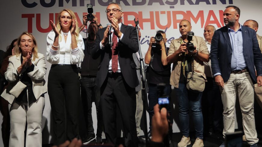 Tufan Erhurman and his wife, Nilden Erhurman, celebrate on stage after their victory in the Turkish Cypriot leadership election in the self-proclaimed Turkish Republic of Northern Cyprus on Oct. 19, 2025.