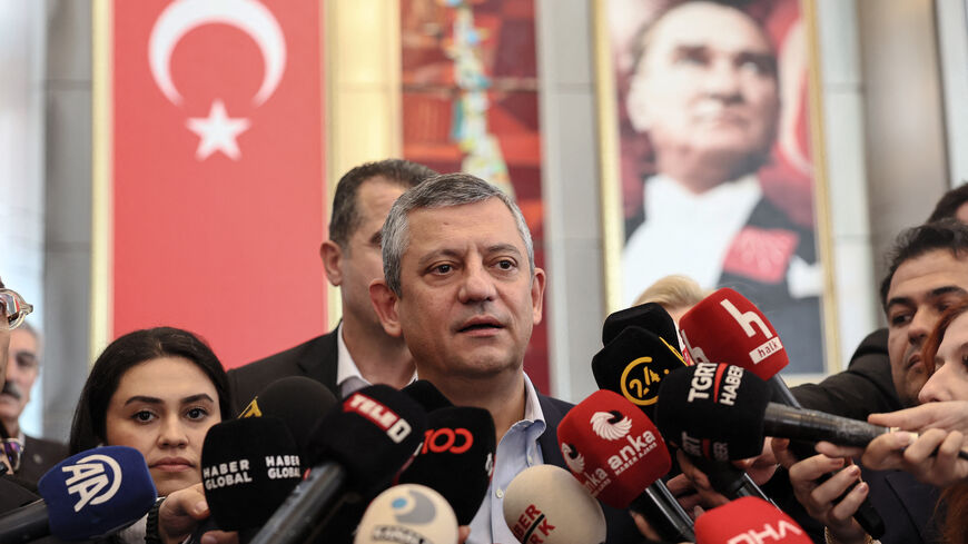 Leader of Turkey's main opposition party, Republican Peoples Party (CHP), Ozgur Ozel addresses the media at the party headquarters after a hearing on corruption charges against the party, in Ankara on October 24, 2025. An Ankara court on October 24, 2025 threw out a graft case against Turkey's main opposition CHP on grounds it had no substance, an AFP journalist at the hearing said. The case, which centred on alleged vote buying at a Republican People's Party (CHP) primary in 2023, was rejected by the judge