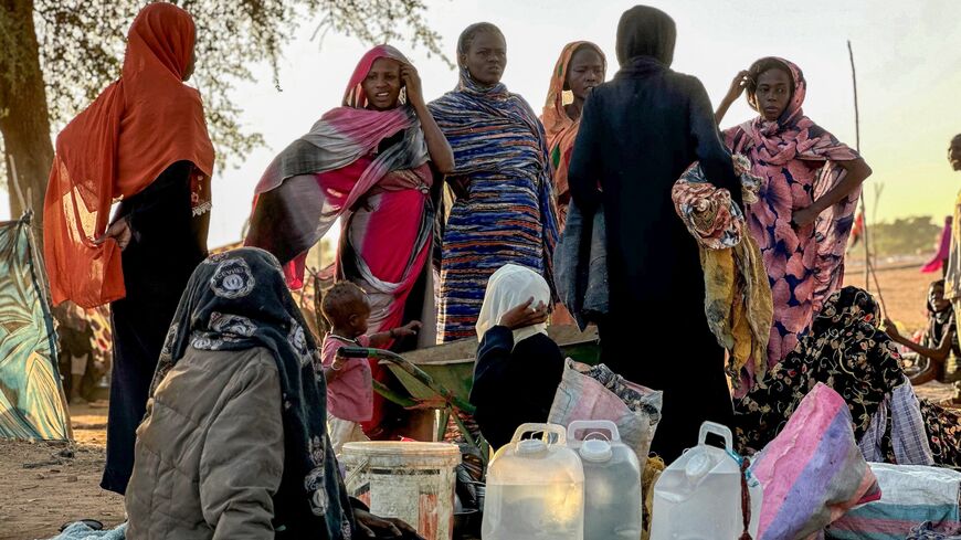 Displaced Sudanese who fled el-Fasher after the city fell to the Rapid Support Forces rest near the the town of Tawila in war-torn Sudan's western Darfur region, on Oct. 28, 2025.